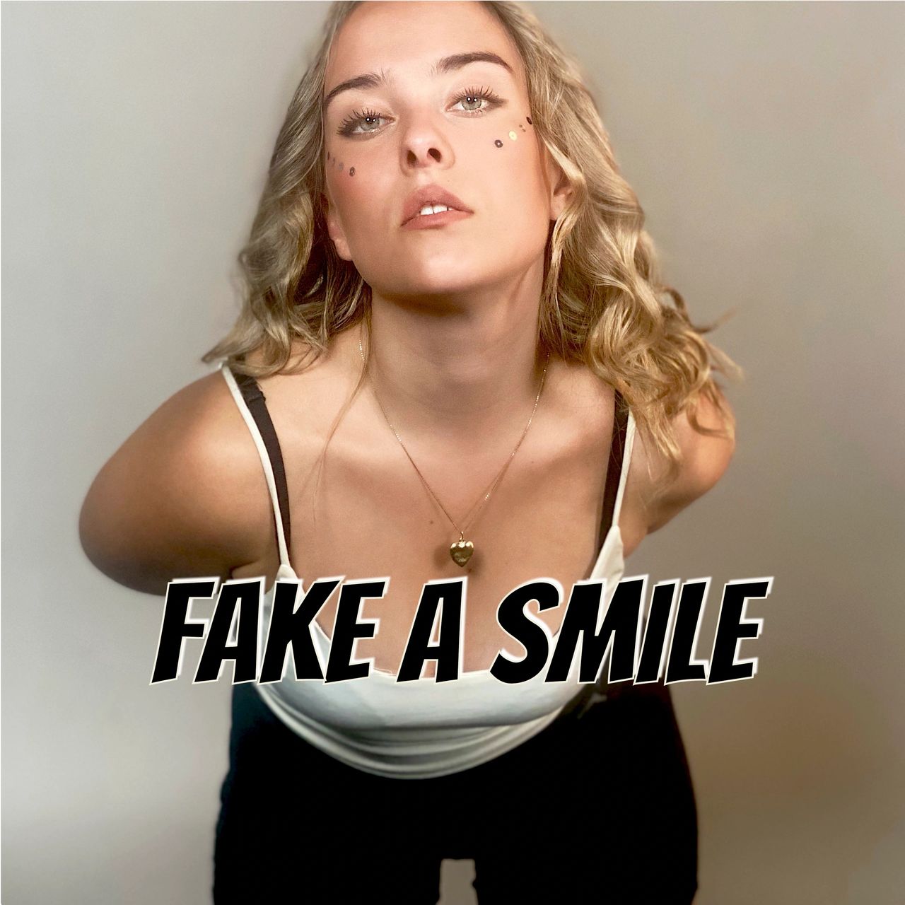 "Fake A Smile" by Ella Lockert : Photo Credits Lockertsville