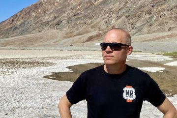 Ulrich Jannert – Two Men by the Harbor